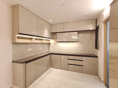 Close-up of the kitchen counter corner in the Elite Homes 3 BHK sample flat